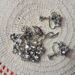Antique like silver plated with diamond like earrings and broach.